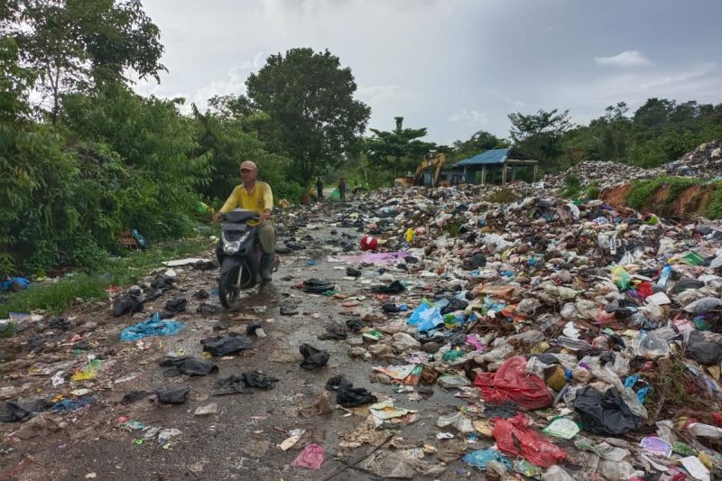 bersihkan sampah